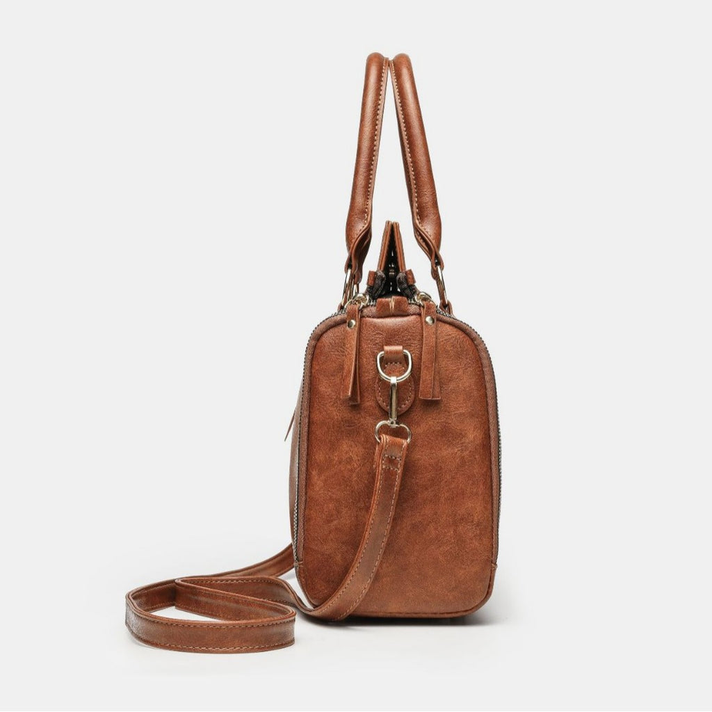 Tote Bag With A Multi-functional, Detachable Shoulder Strap For Handheld Use