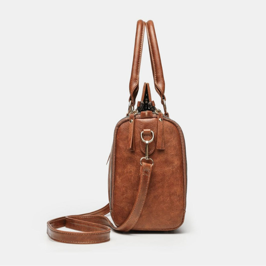 Tote Bag With A Multi-functional, Detachable Shoulder Strap For Handheld Use